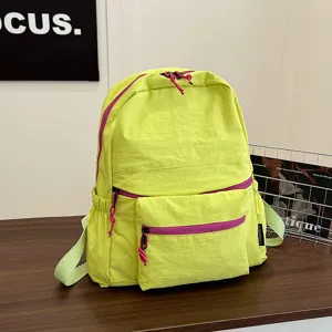 Neon green casual backpack for women, large capacity stylish travel school bag with zippers.