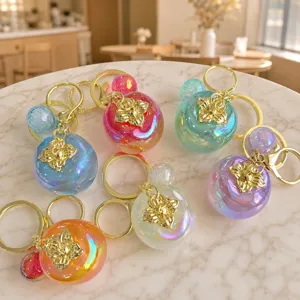 Colorful persimmon keychain cute acrylic bag pendant gold accent aesthetic charm accessory