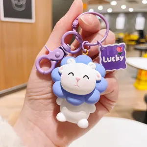 Cute resin sheep keychain with purple clasp and lucky tag for bag or car keys decoration.