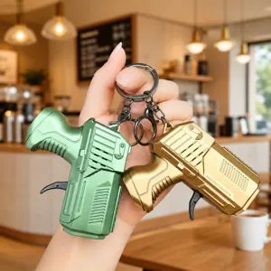 Creative Mini Pistol Keychain Novelty Stress Relief Gear Toy Simulation Drill Dinosaur Flint Key Ring Creative Kids Gift Pendant Accessory