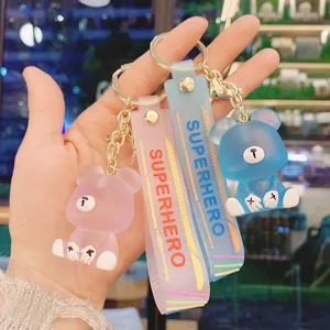 Cute resin jelly bear keychain with strap, transparent couple bag pendant mobile accessory.
