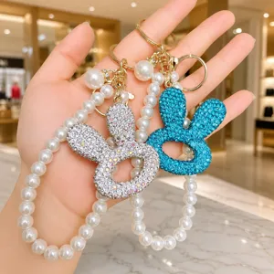 Koreanische Strass-Hasen-Schlüsselanhänger mit eleganter Perlenkette und stilvollem Handyzubehör