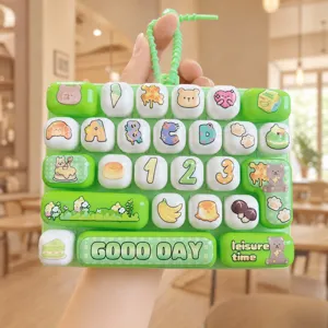 Cute decompression keyboard keychain, green cute animal toy bag pendant for students.