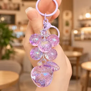 Purple crystal bubble grape apple keychain detail closeup cute bag charm accessory pendant gift