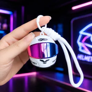 Cool mini motorcycle helmet keychain with colorful visor and portable lanyard for bags.