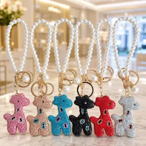 Pearl chain rhinestone giraffe keychain, cute crystal bag charm and phone accessory.