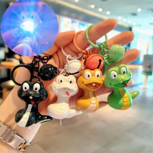 Llavero de serpiente de dibujos animados LED luz nocturna sonido divertido bolsa regalo