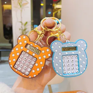 Llavero calculadora con cabeza de oso de cuadrícula creativo portátil para regalo ideal