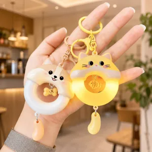 Leuke oplichtende dierensleutelhanger, creatieve cartoon kat hond hanger voor tas.