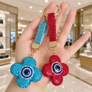 Porte-clés trèfle strass mauvais œil brillant accessoire de sac à main de luxe chic.
