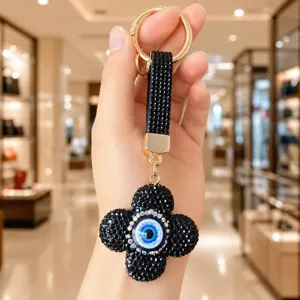 Porte-clés trèfle à quatre feuilles mauvais œil, breloque strass sac luxe cadeau.