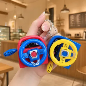 Mini simulation steering wheel keychain decompression toy with sound and gear shift.