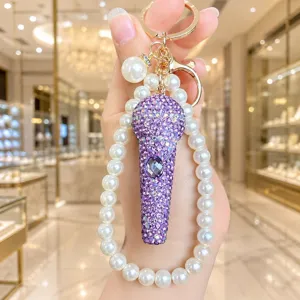 Strass microfoon sleutelhanger parel tas hanger luxe glimmend elegant voor dames sieraden.