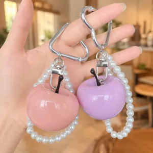Resin apple keychain with pearl bracelet, cute pendant for bags and phones.