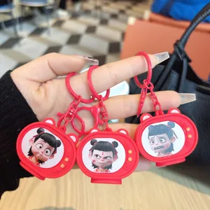 Cute Nezha TV cartoon keychain for bags, funny emoji pendant accessory, red silicone style.