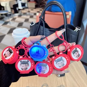Cute Nezha 2 flashing TV keychain, creative cartoon character meme backpack pendant gift.