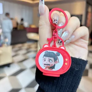 Cute Nezha 2 cartoon TV keychain detail shot, funny meme character pendant for school bag.