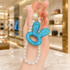 Schicker Glitzer-Hasen-Schluesselanhaenger mit Perlenkette fuer Handtaschen und Schluessel.