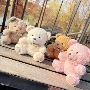 Cute curly plush teddy bear doll pendant with bow tie, perfect for cute bag decoration and keys.