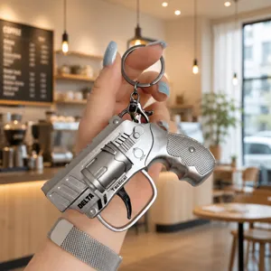Mini flint pistol keychain decompression metal toy creative gift for kids and adults daily use