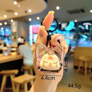 Schattige transparante zandloper sleutelhanger voor tassen en telefoons met vloeibaar design.