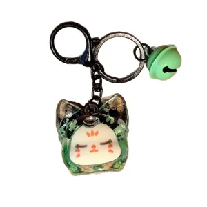 Leuke Sanrio Kiki drijfzand sleutelhanger met bel, glitter tas hanger charmant.