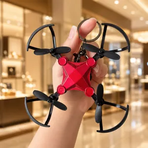 Portachiavi mini drone creativo ciondolo quadricottero in metallo accessorio zaino chic
