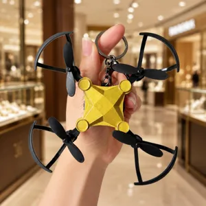 Dettagli del portachiavi mini drone creativo con protezioni eliche pieghevoli, ciondolo zaino.