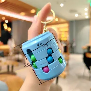 Mini creative puzzle ball keychain, portable blue can shape decompression toy for bags.