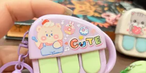 Cute music piano recorder keychain cute decompression student toy bag pendant detail view