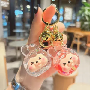 Cute acrylic liquid glitter keychain, double charm bag pendant with bells for women and girls.