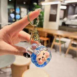 Cute liquid quicksand acrylic keychain, stylish cartoon character bag charm and phone accessory.