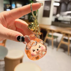Cute liquid quicksand acrylic keychain, stylish bag pendant and adorable cartoon accessory for gifts.
