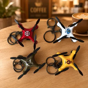 Mini drone keychain toy, creative quadcopter model key ring pendant, cute gift for kids.