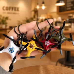 Creative mini drone keychain for kids, cool model pendant for car keys and bag gift.