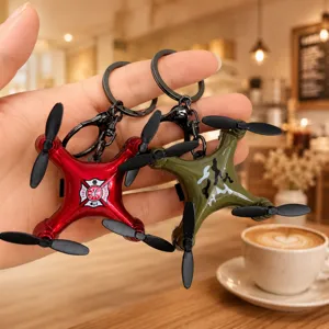 Mini drone keychain creative aircraft model pendant for car keys and gift hanging ornament.