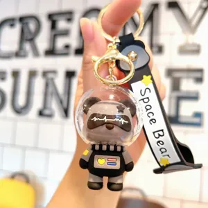 Lindo llavero de oso espacial astronauta colgante de bolso tendencia accesorio coche