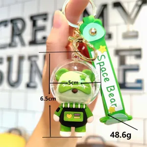 Lindo oso espacial astronauta llavero de silicona colgante bolsa accesorio verde.