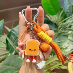 Cute toast bread keychain with braided lanyard and funny cartoon charm for bag decor.