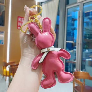 Creative PU leather bunny keychain with bow, cute pink bag pendant for women gifts.