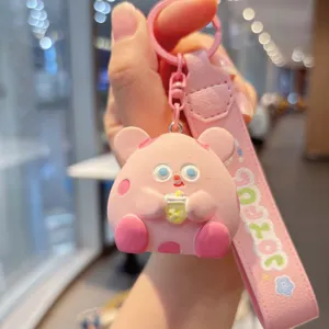 Cute pink boba mouse keychain with strap, resin cartoon animal backpack charm gift for girls.