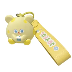 Cute cheese mouse resin keychain with bubble tea pendant and yellow strap for backpack.