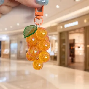 Clear acrylic grape cluster keychain, cute fruit bag charm and aesthetic phone strap detail.