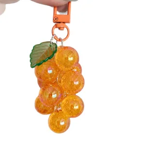 Translucent acrylic orange grape cluster keychain, cute crystal fruit bag pendant and charm.
