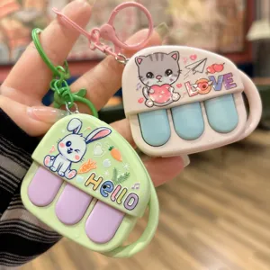 Cute mini piano recorder keychain toy, decompression bag pendant and student cute hanging accessory.