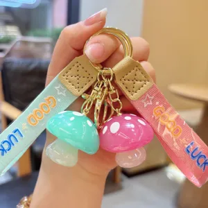 Cute jelly mushroom keychain with colorful glossy resin pendants and lucky strap detail view.
