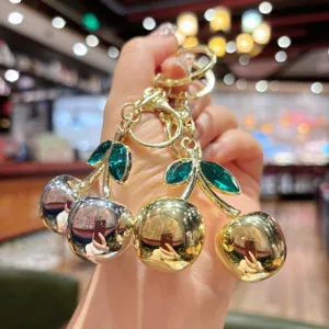 Metal cherry keychain, cute electroplated bag charm and key ring for women and girls.