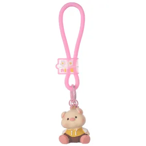 Simpatico portachiavi in silicone rosa con ciondolo maialino in resina per borsa