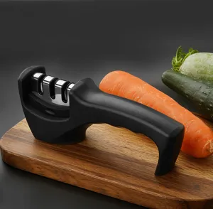 Manual 3-slot kitchen knife sharpener with ergonomic black handle for fast home sharpening.