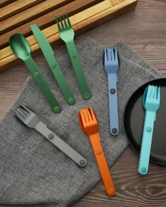 Detailed view of colorful magnetic portable camping cutlery set featuring forks, spoons, and knives.